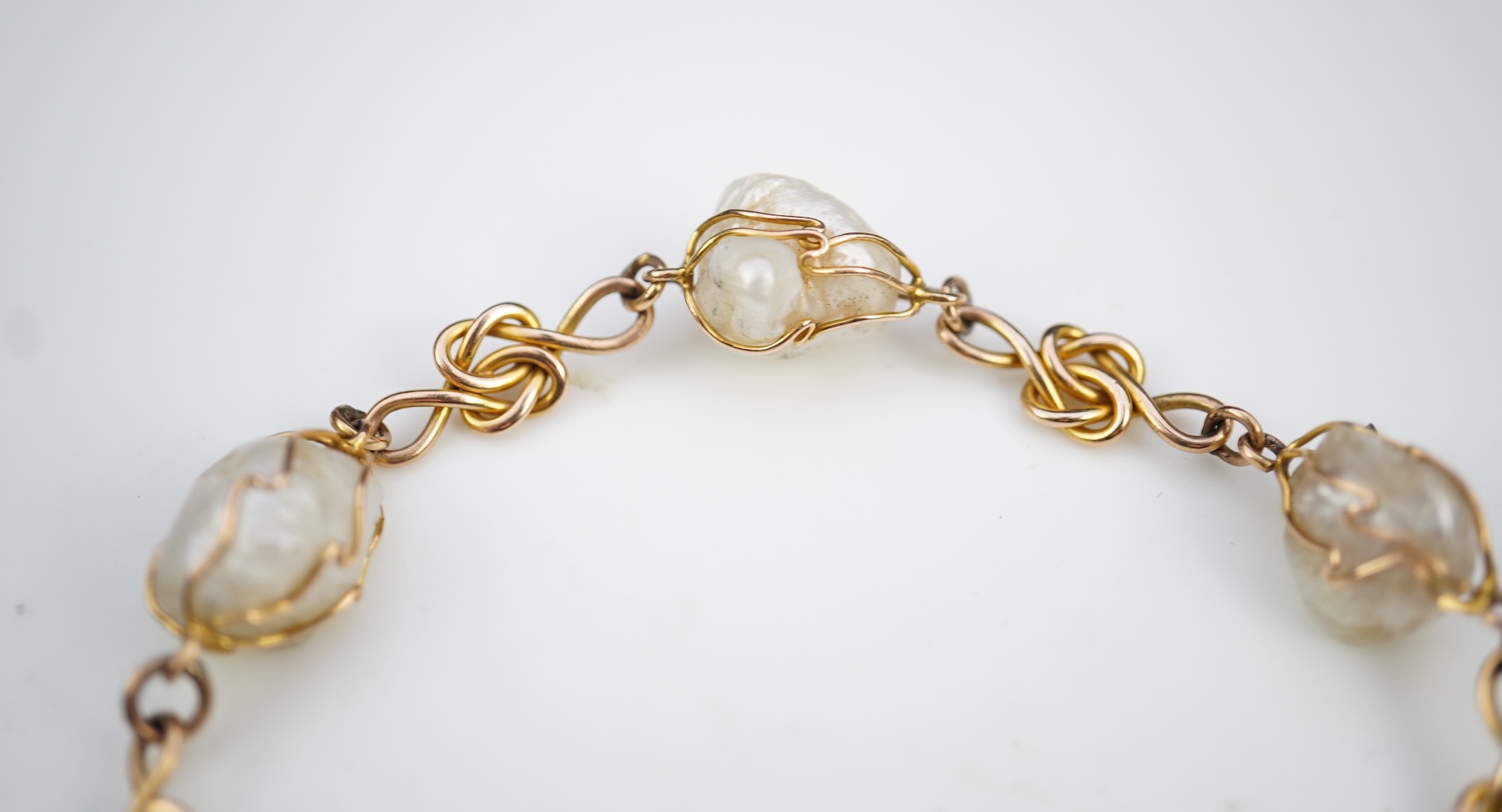 An unusual gold and pearl bracelet, early 20th century